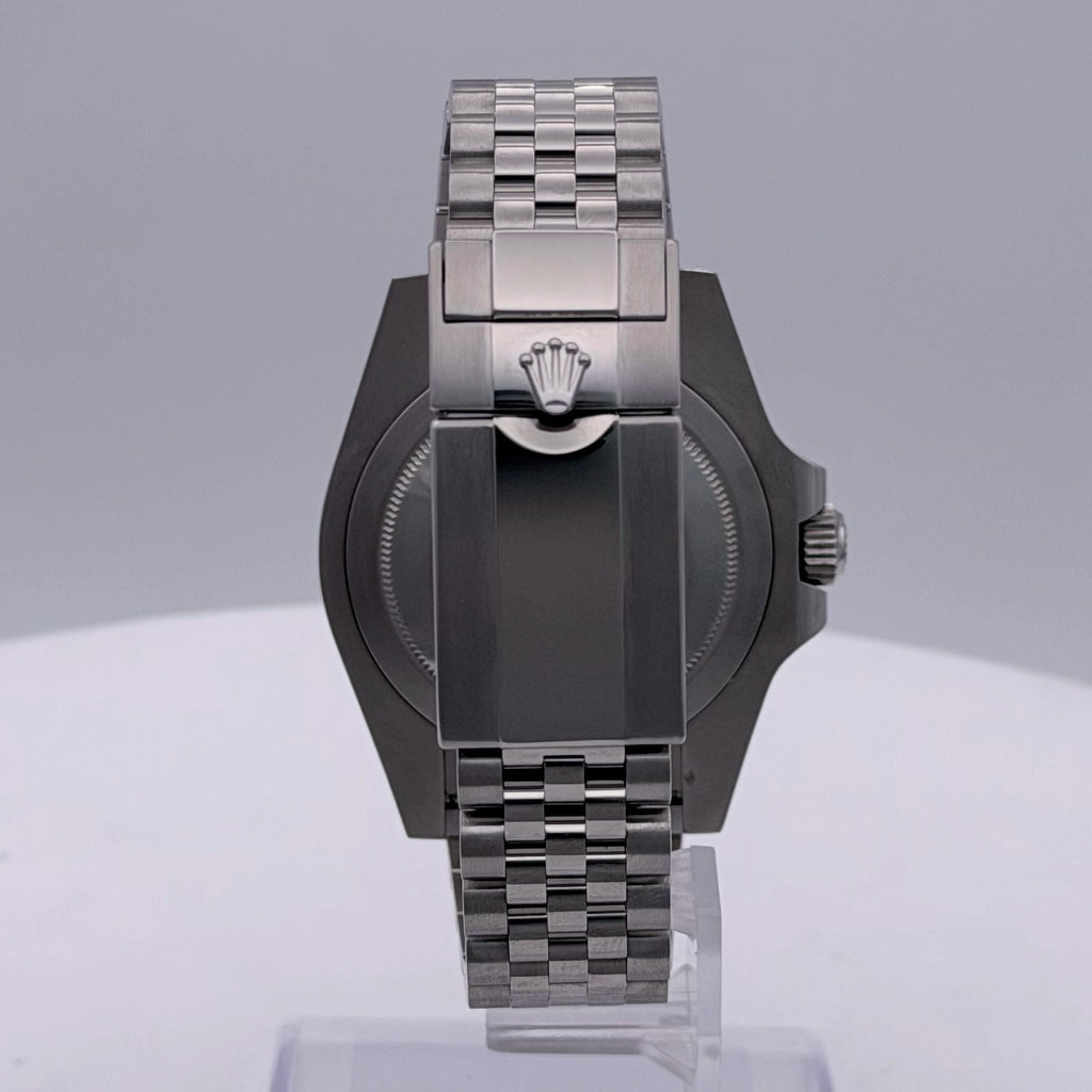 Rolex GMT-Master II Bruce Wayne Black Dial on Jubilee 126710GRNR Papers 2026
